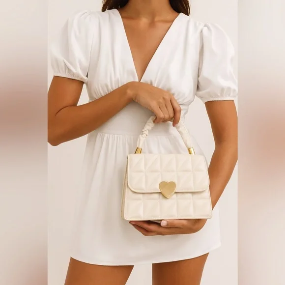 Cream Quilted Handbag with Gold Heart Accent - Picture 1 of 4